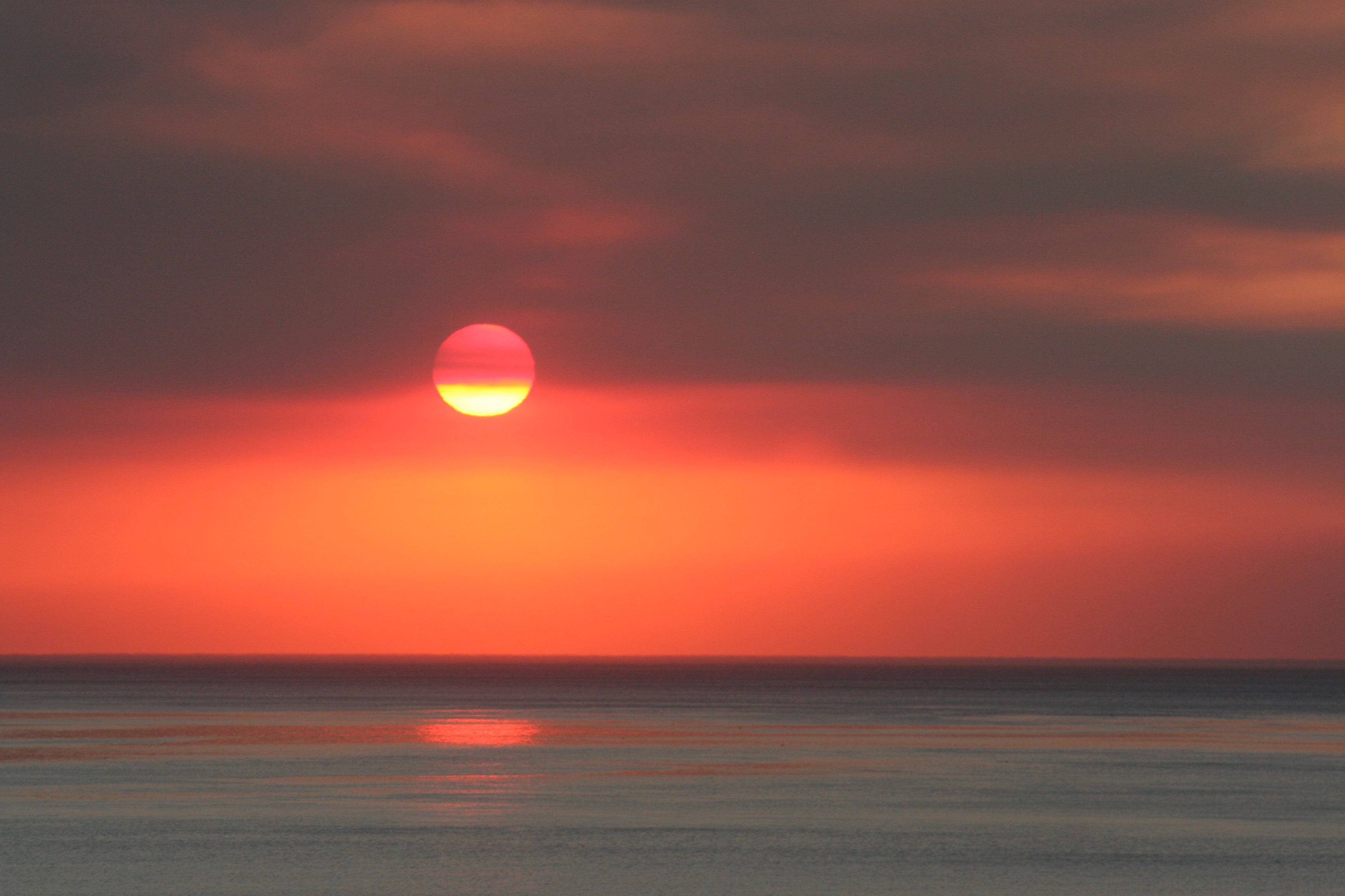 Smoke-enhanced sunset over Malibu.